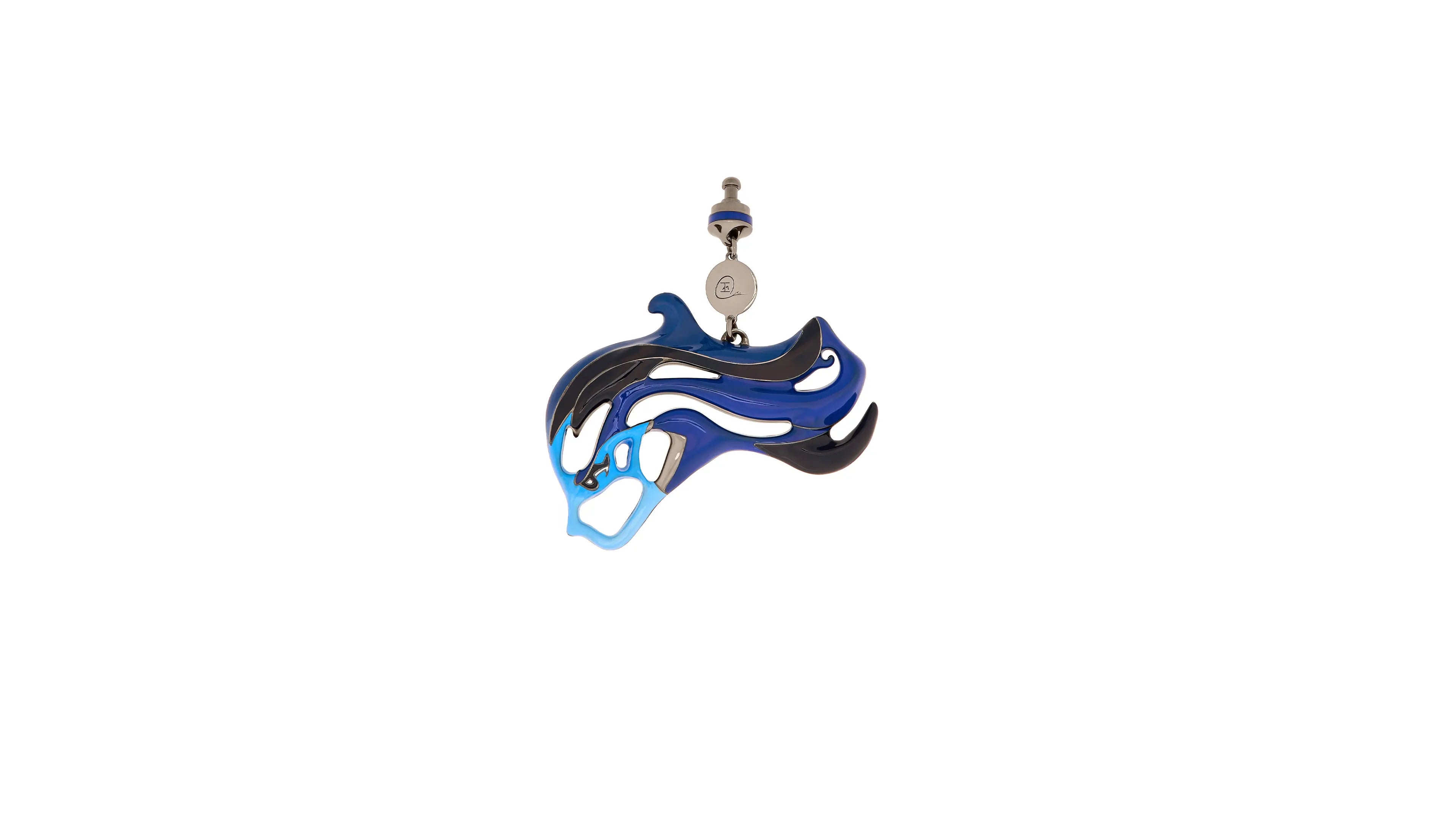 Decorative pendant with blue and black design on a white background