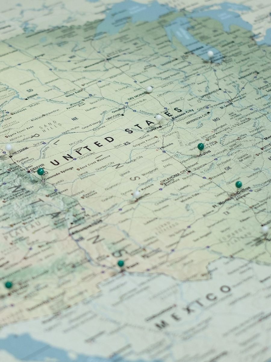 United States map displaying multiple green pins on specific locations across various states.