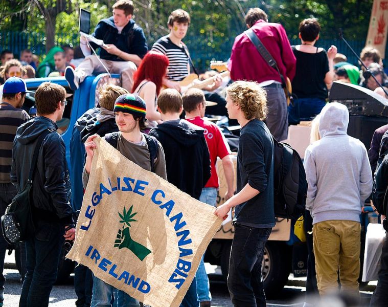 A cannabis march in Ireland cantered on two young men holding a fabric sign labelled Legalize Cannabis Ireland
