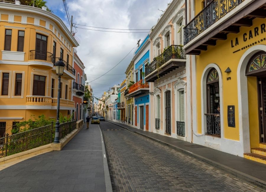 Colourful colonial buildings along a cobblestone street in Old San Juan, Puerto Rico