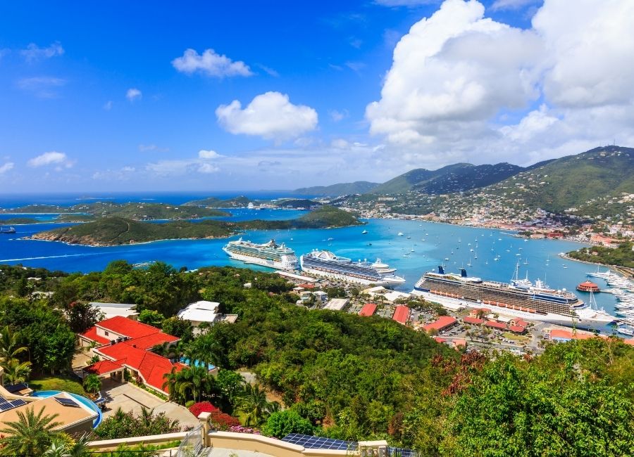 Panoramic view of Charlotte Amalie harbour in St. Thomas, U.S. Virgin Islands, with cruise ships and blue water
