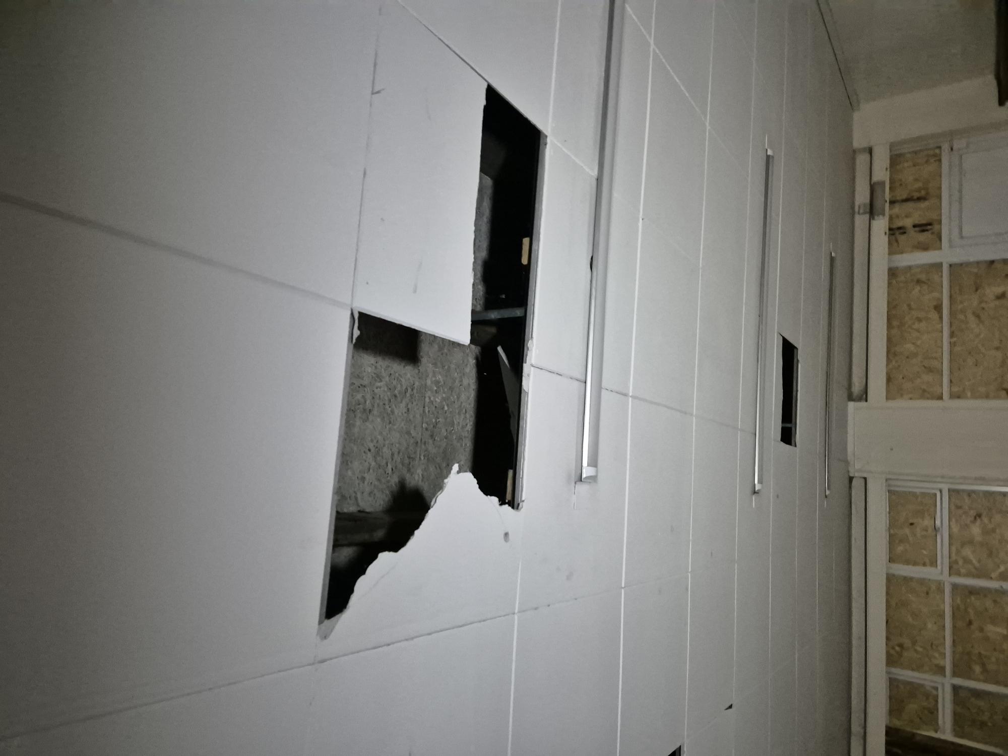 Damaged asbestos insulating board ceiling tile at St Chad's Church