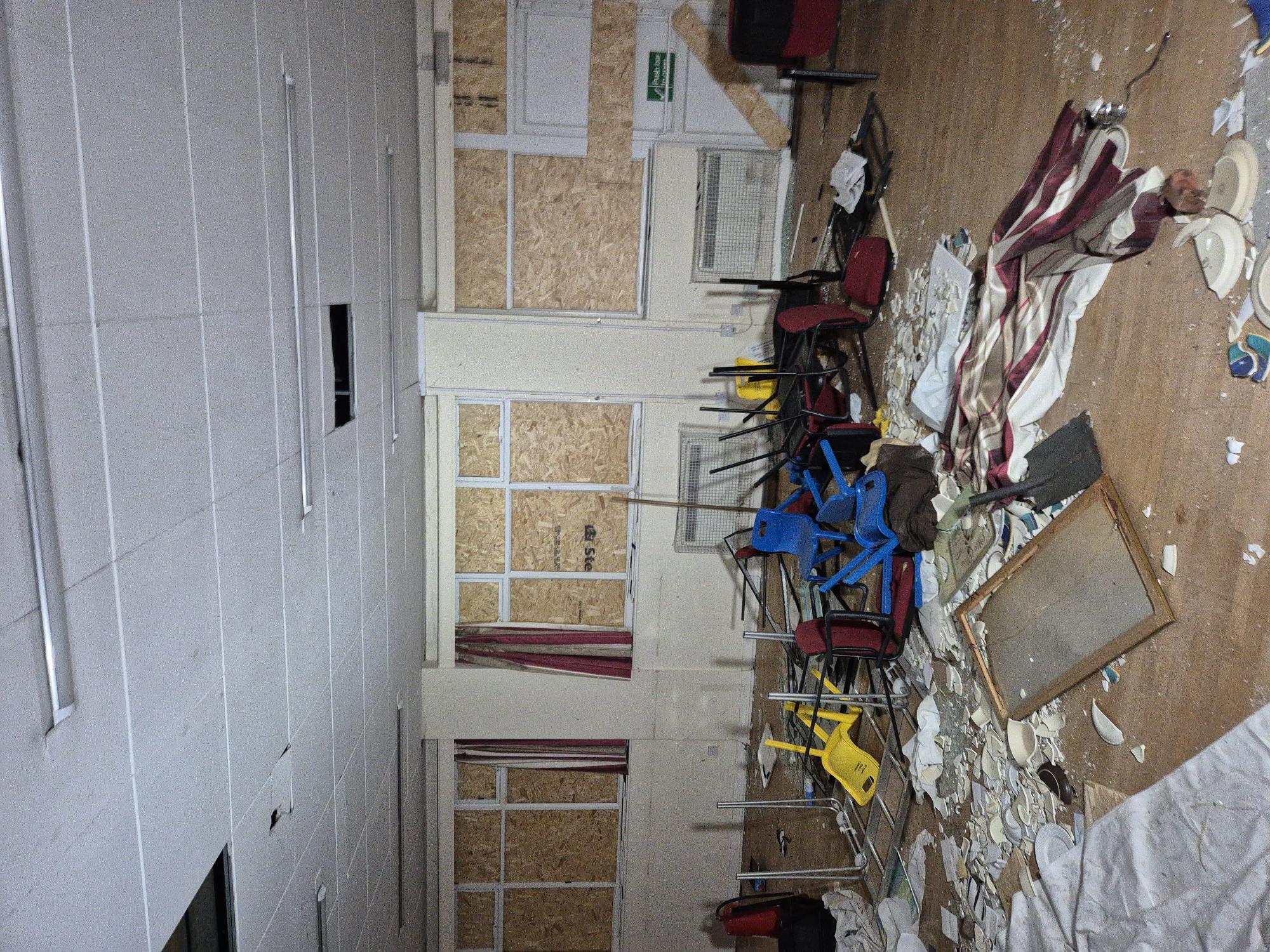 Contaminated chairs and contents in the church hall before removal