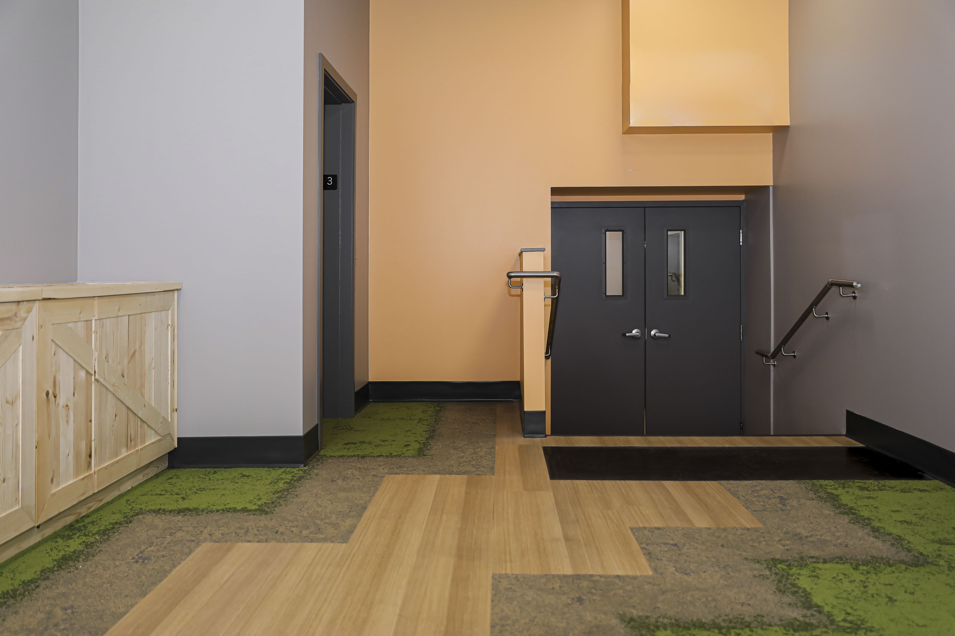 Open-concept childcare facility Victoria BC - Coastline church renovation by Outlook Project Management with multiple activity zones, modern furniture, and integrated storage solutions