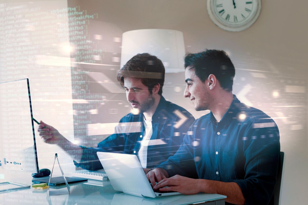 Photo of people working on computers