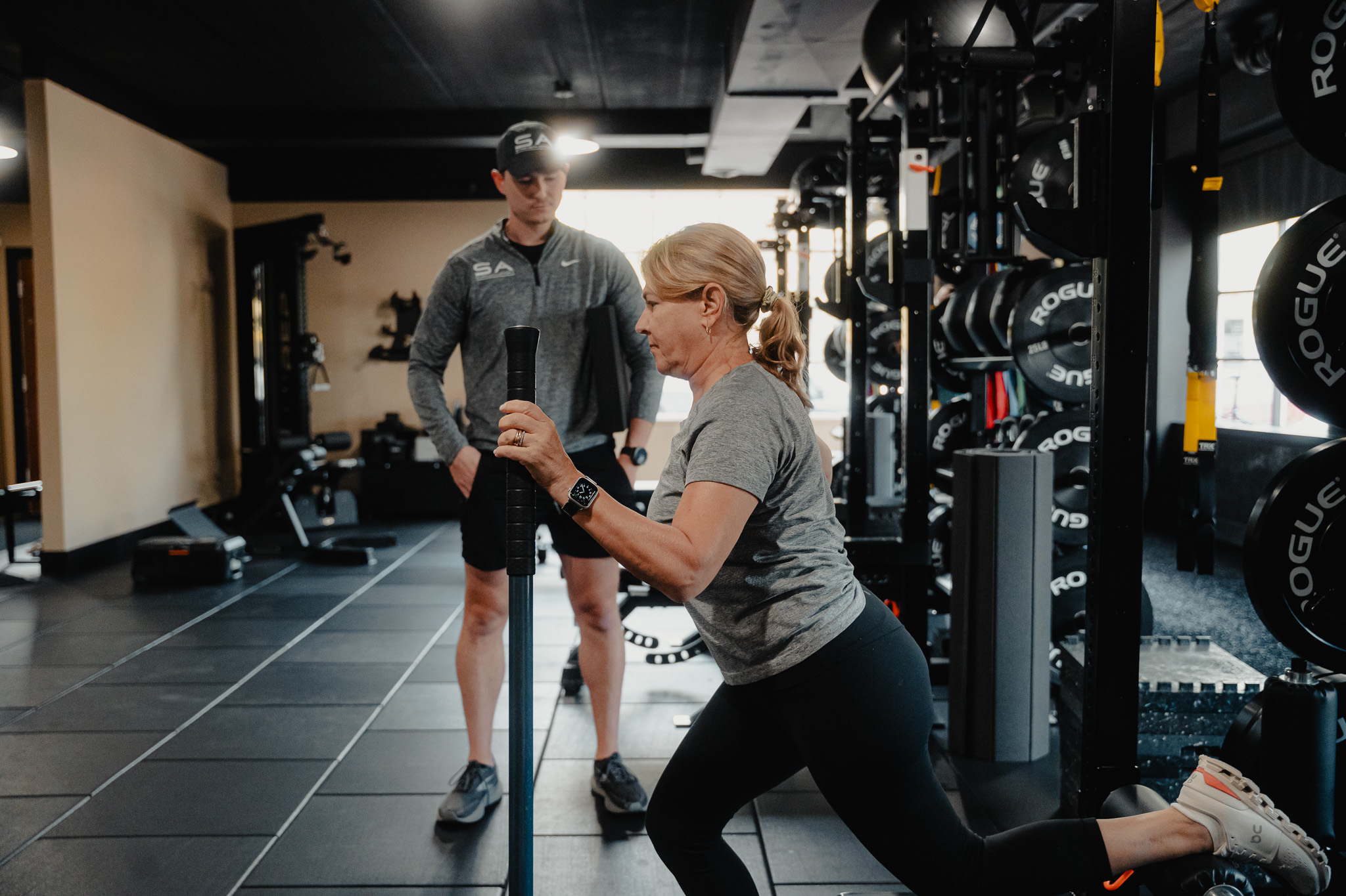 A Strength Affect coach running a movement assessment in Northfield, Illinois