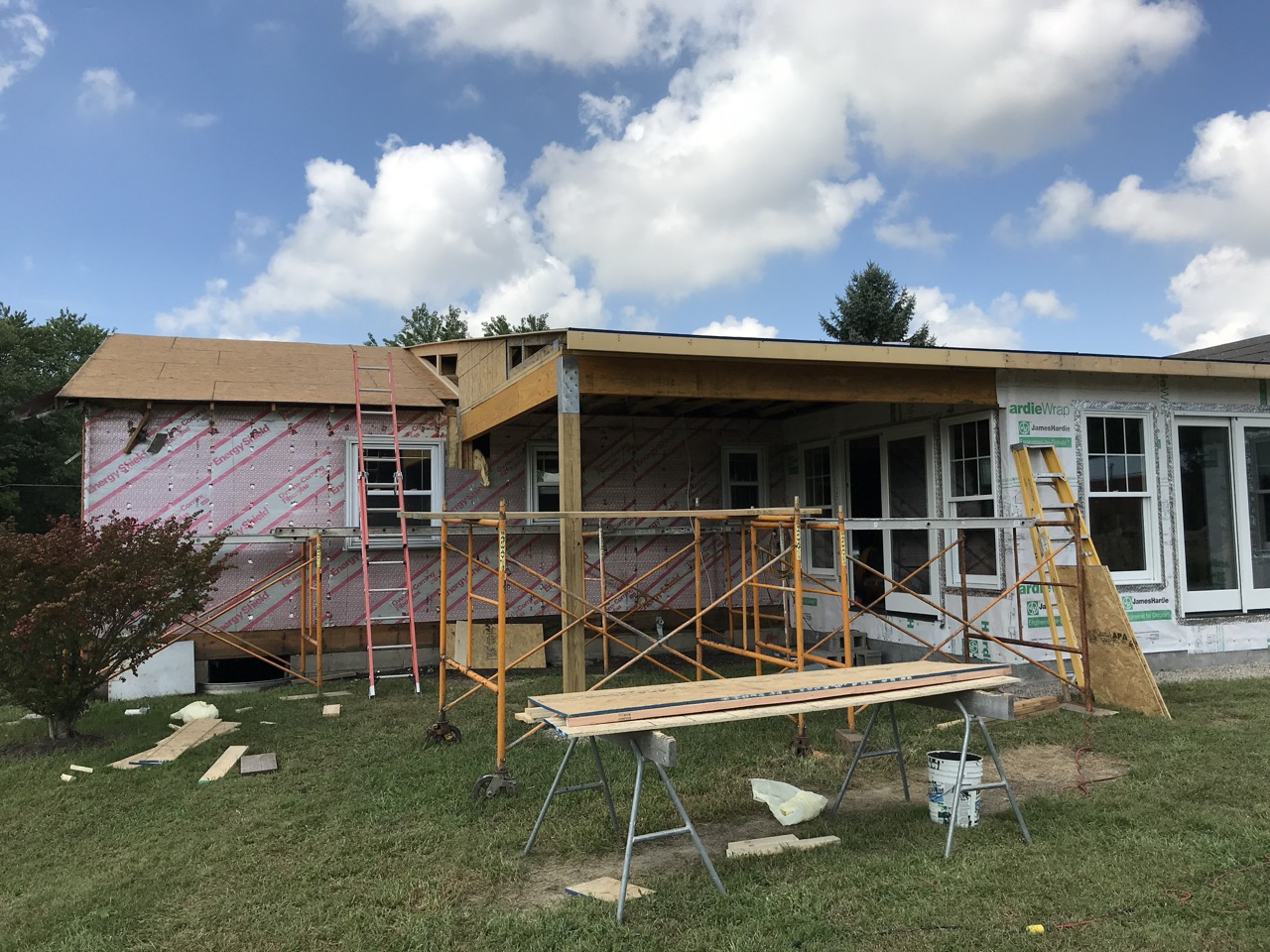 Complete James Hardie Siding Guide for Ohio Homeowners: siding installation process shown as construction work done on a home.