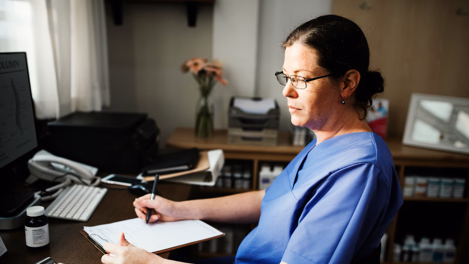  A medical professional calculating headcount using coverage hours and a relief factor for a 24-hour shift schedule.