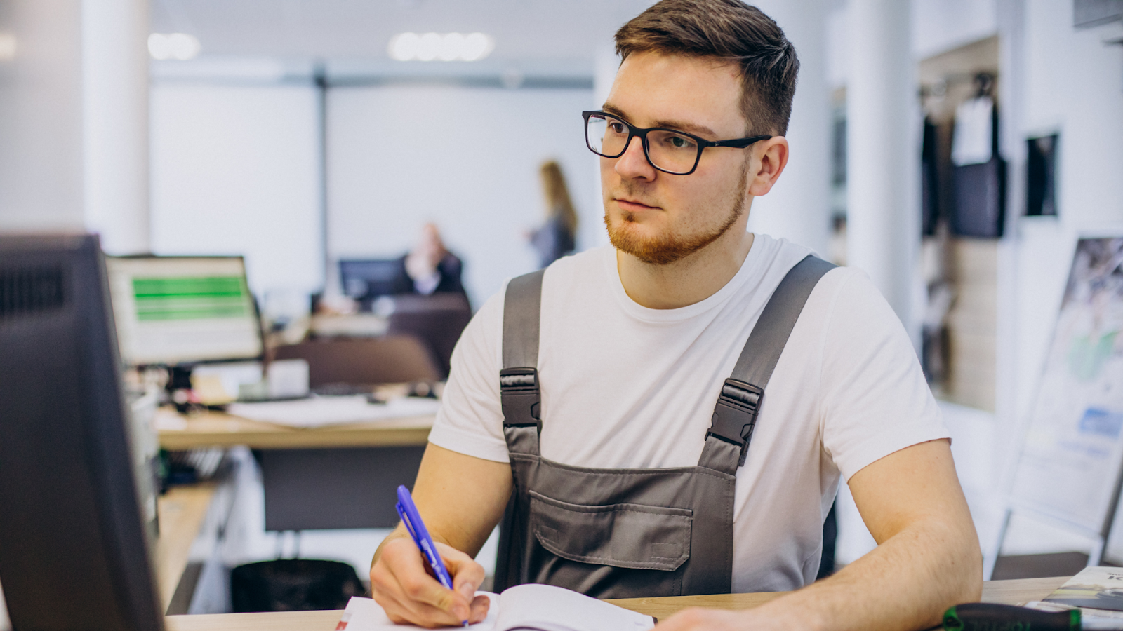 A technician notes information while researching how 24-hour shift schedules work.
