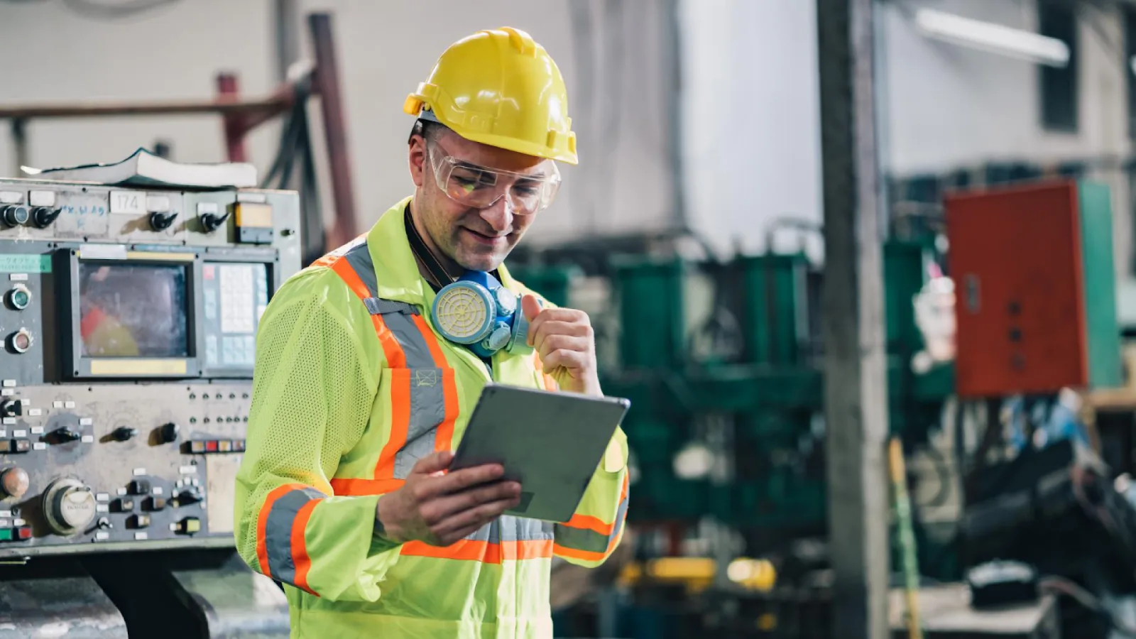 A technician uses a tablet to monitor midweek alerts and controlling labor costs before payroll closes.