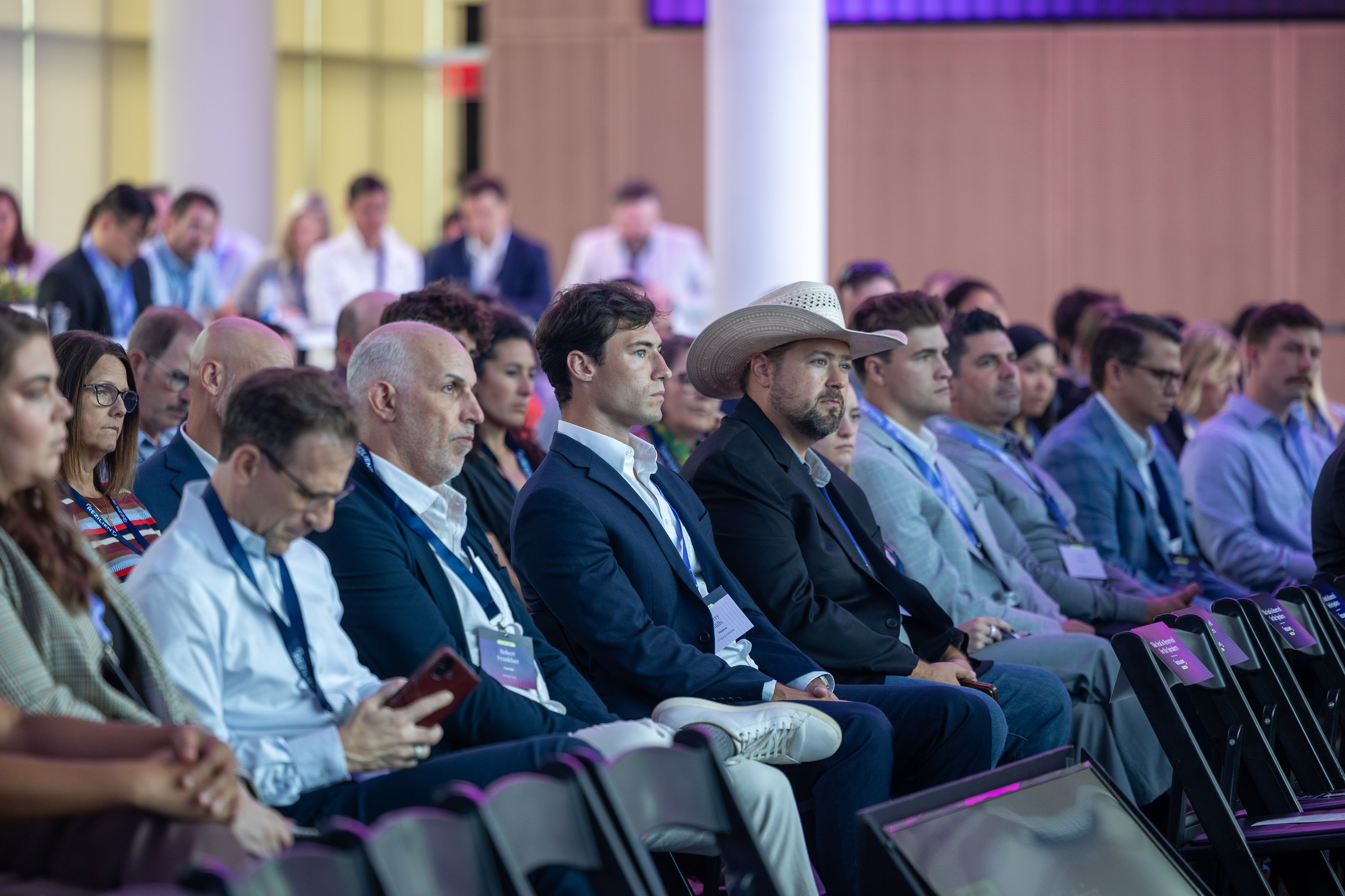 Healthcare and employer leaders listen to a speaker at the Rezilient Health Summit 2026.