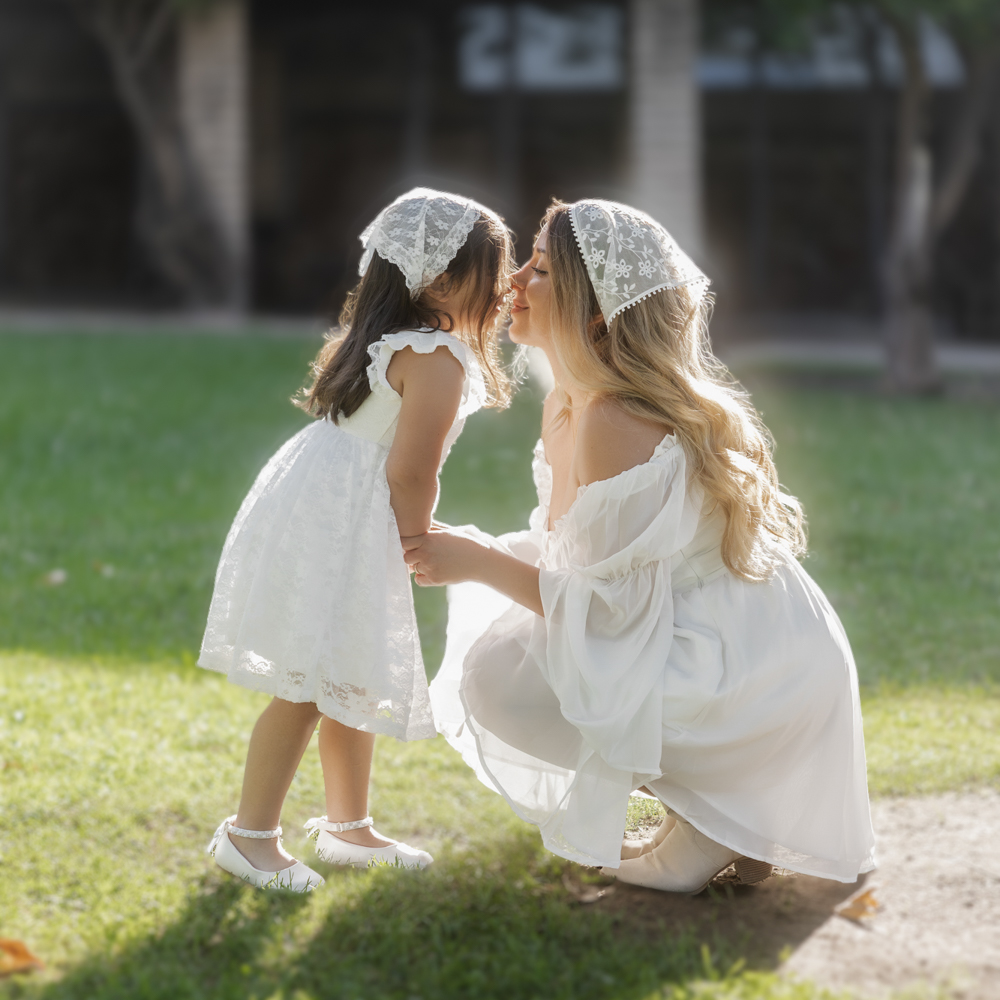 Photography by Kristina Gabrielyan of a mom and daughter in a bohemian dreamy like photoshoot