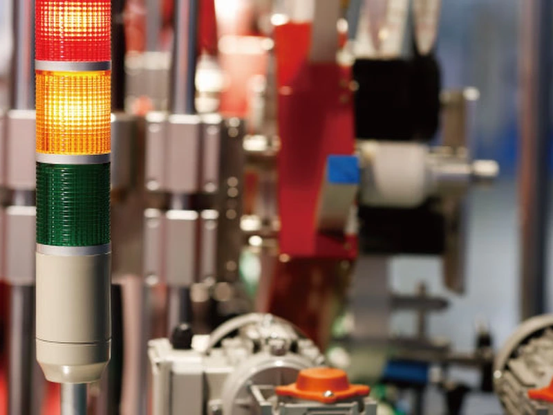 Industrial signal tower light on manufacturing equipment in factory