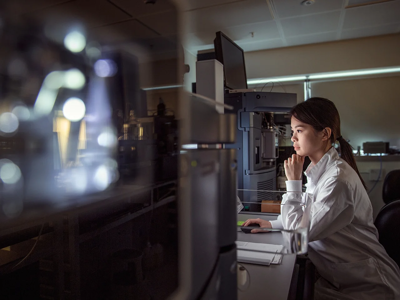 Medical researcher at workstation