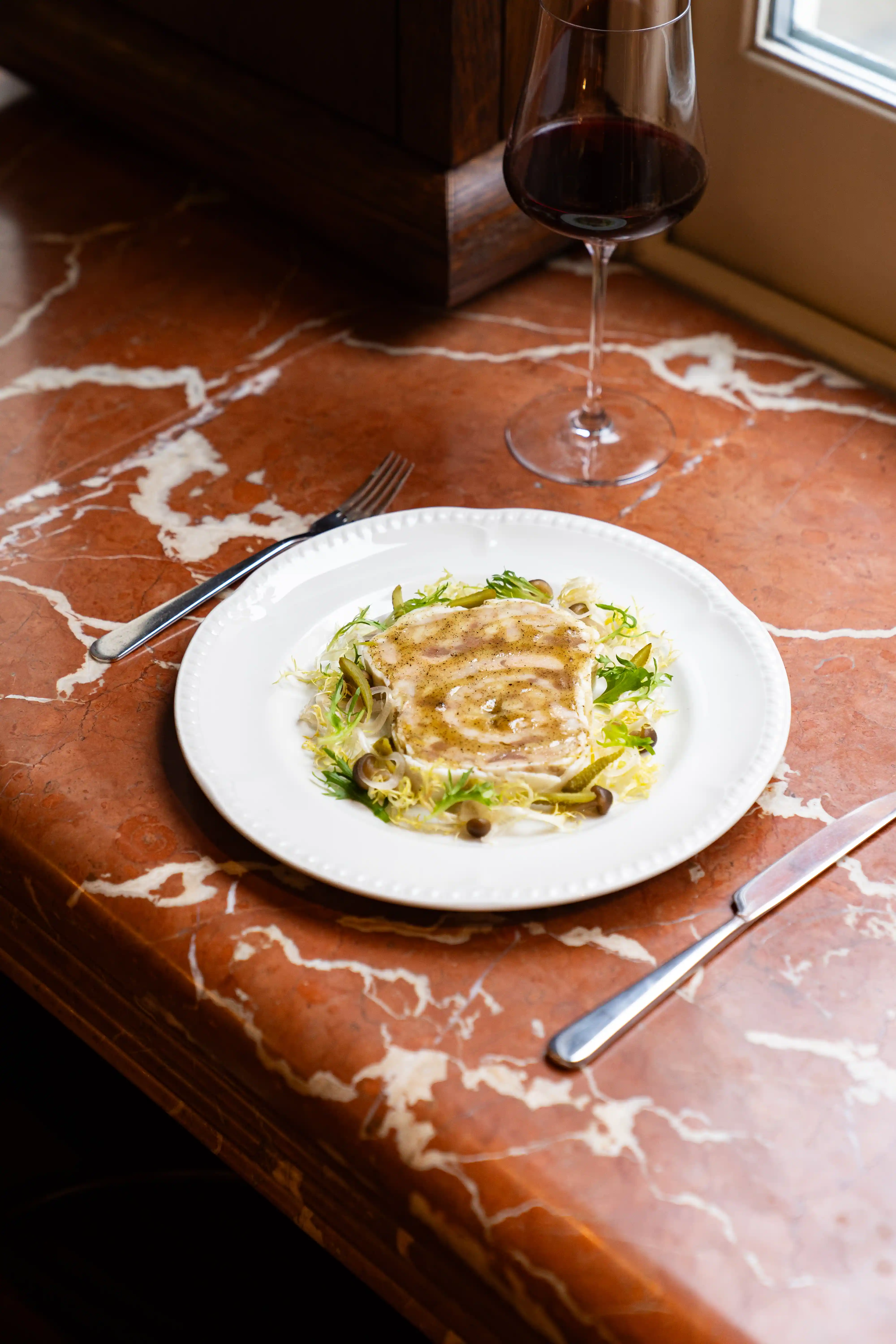 Bread with butter and wine - Henri Restaurant Henrietta Hotel