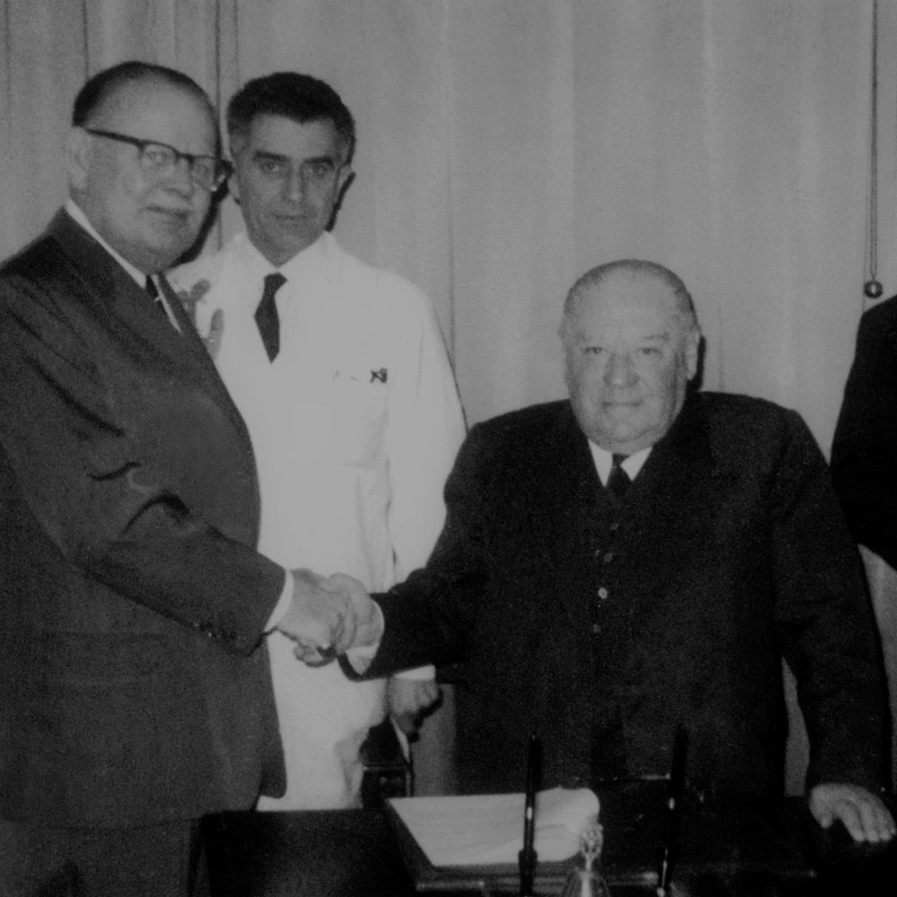 Pietro Bertarelli shaking hands
