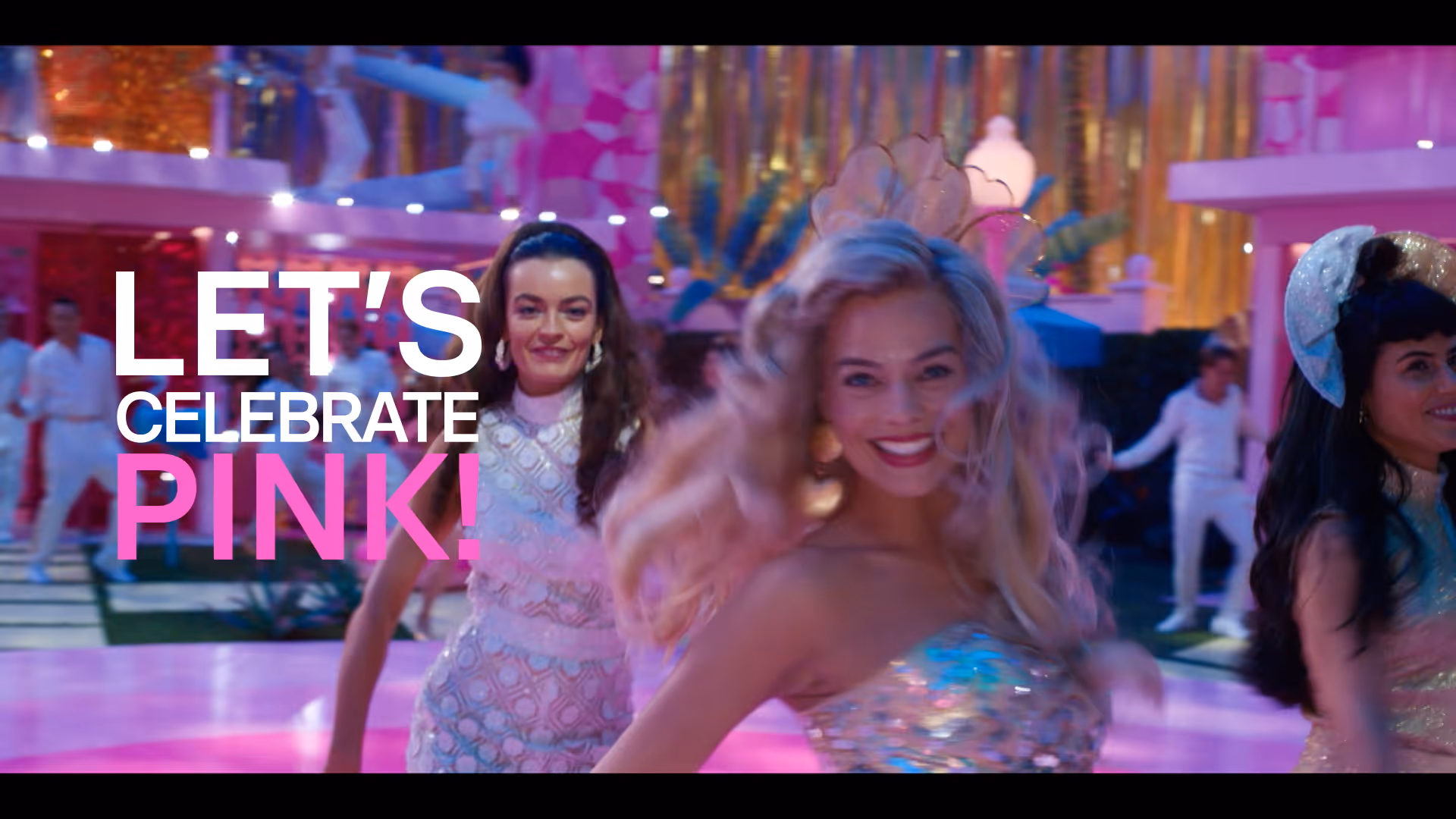 Screenshot from the movie "Barbie": Barbie smiling on the dance floor
