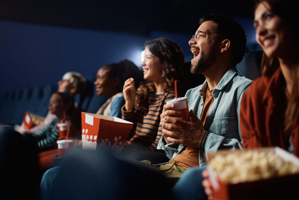 laughing on the theatre seats