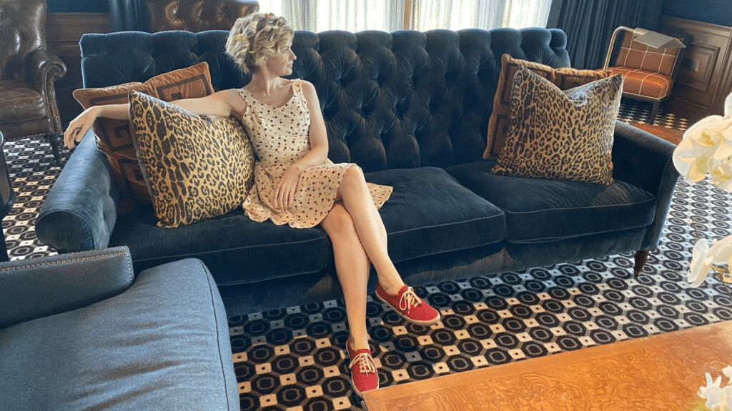 old money aesthetic girl sitting on the couch 