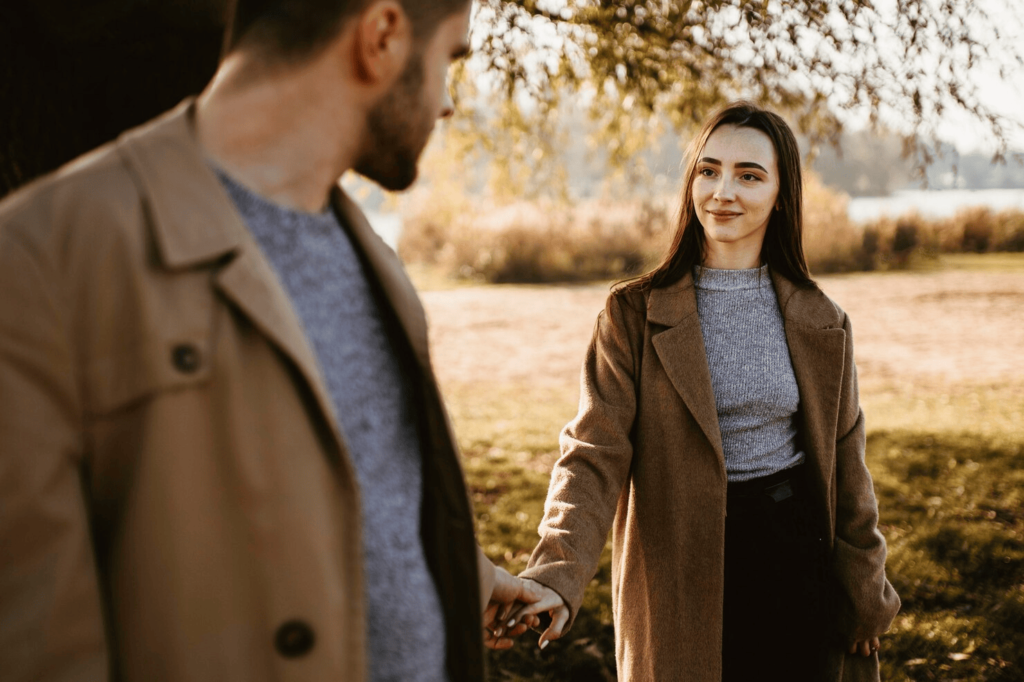A man and a woman smilling about new relationship