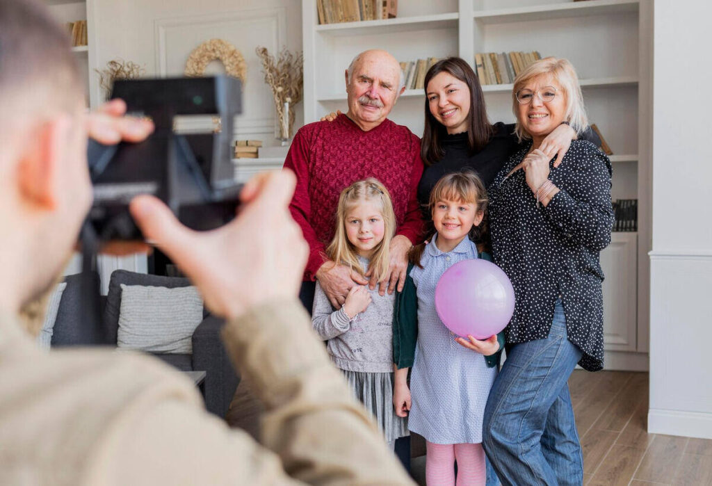 a photographer taking a picture of a family 