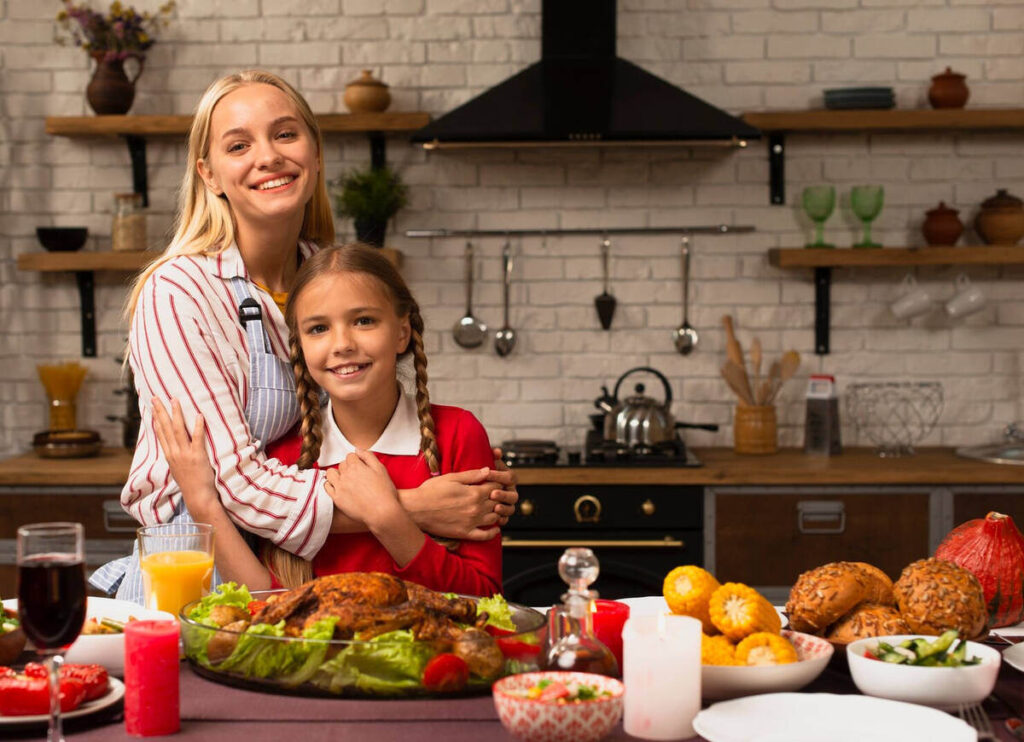 mom and her daughter preparing a feast for reunion
