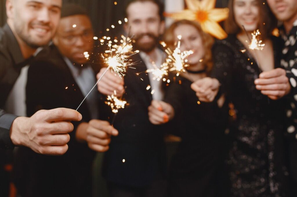 A group of friends having a New year's eve celebration