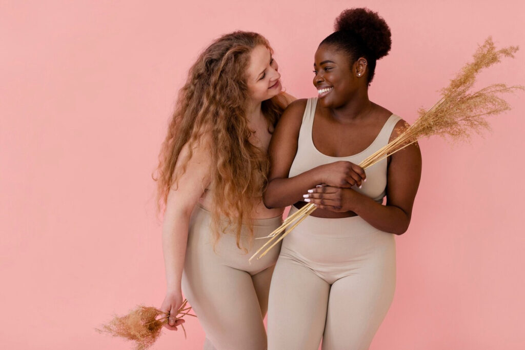 Two women thankful for self-love 