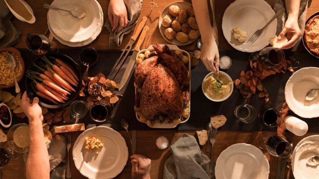 Top view of a family enjoying Thanksgiving meal