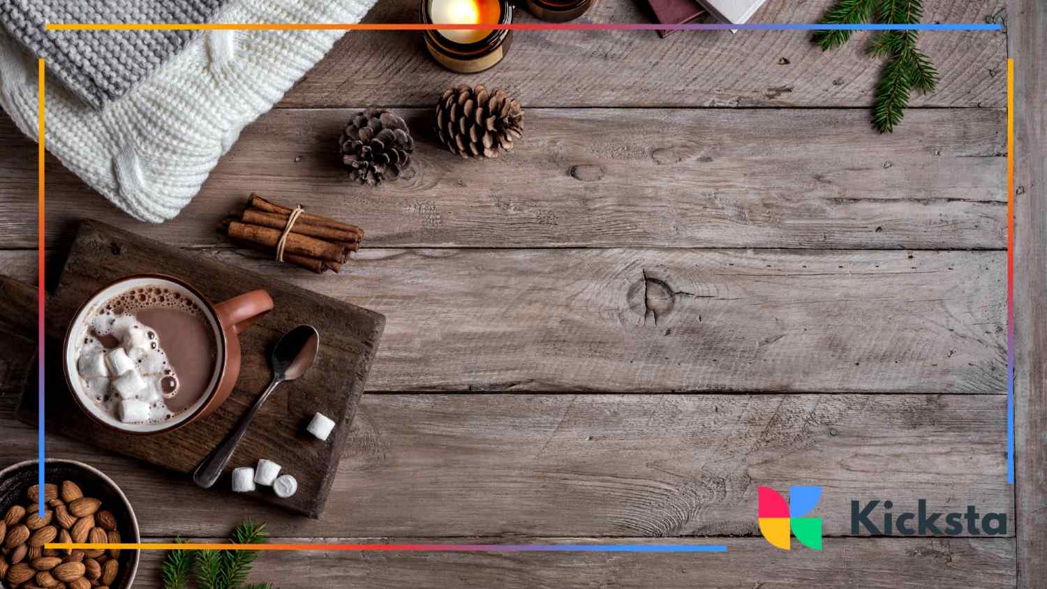 A rustic wooden table with hot cocoa, cinnamon sticks, and cozy knits—perfect for a warm, winter-themed brunch moment
