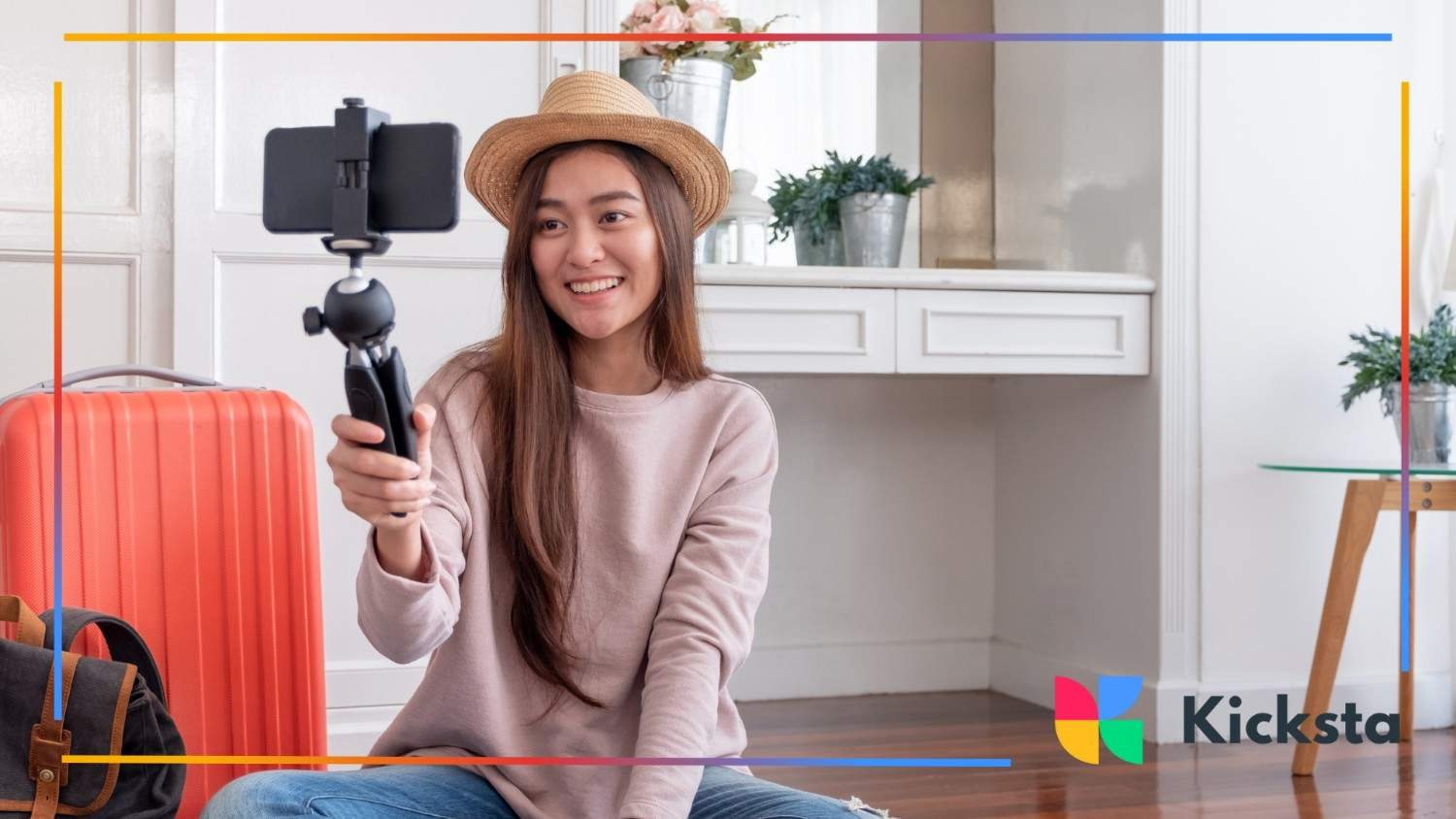 Smiling Influencer with Travel Gear and Phone Tripod