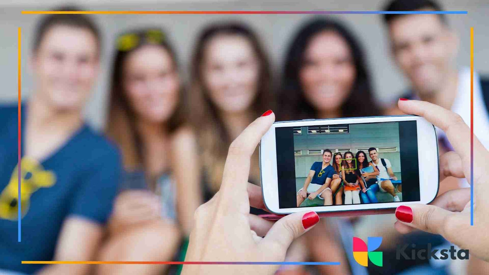 Someone taking a group selfie with friends using a smartphone