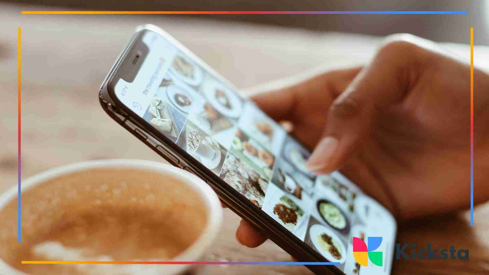Person scrolling through food photos on a smartphone next to a coffee cup