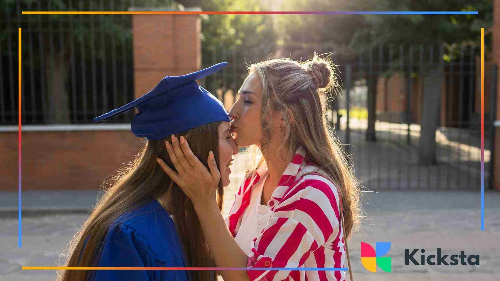 Graduation celebration with a kiss on the forehead