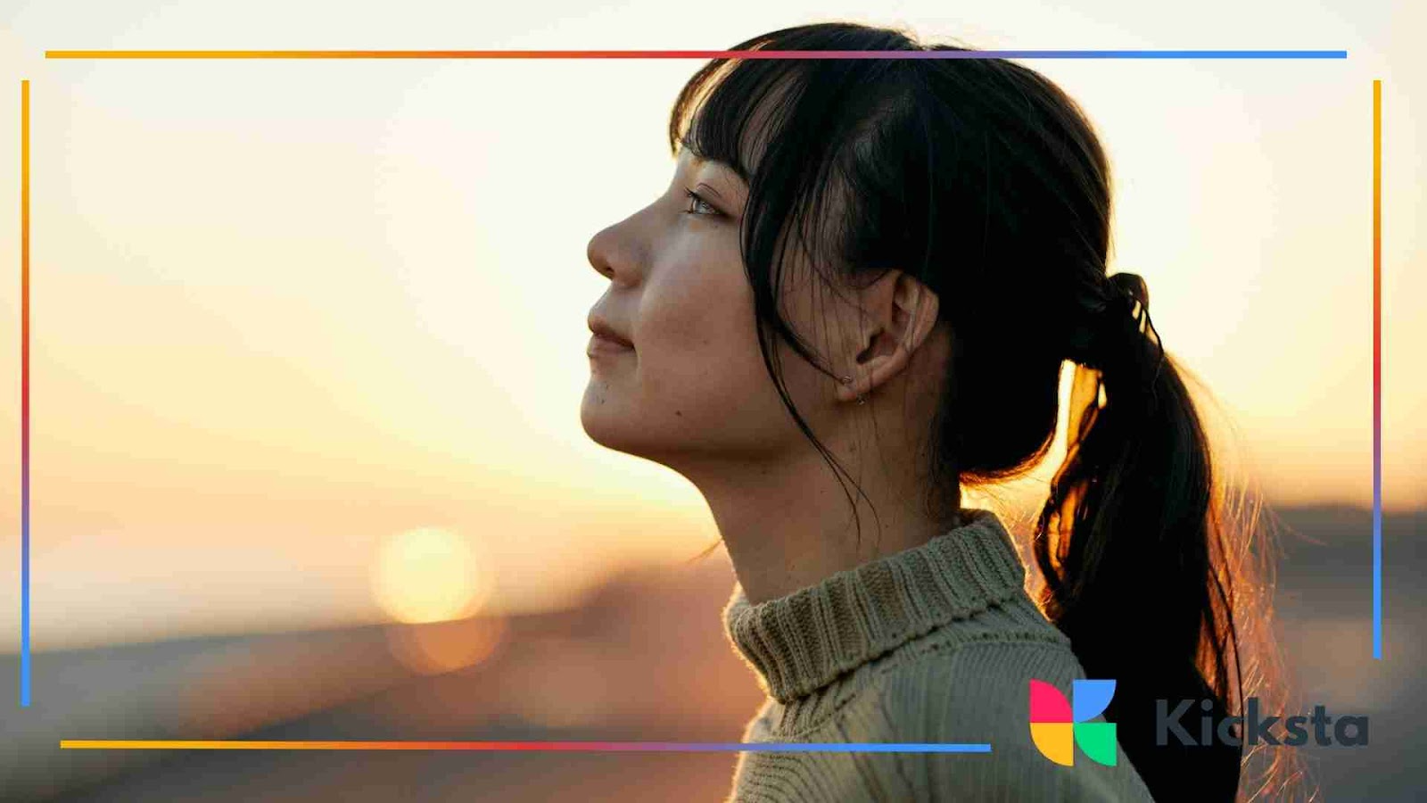 Woman in profile at sunset looking thoughtful