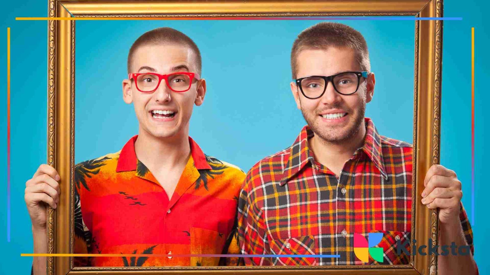 Two guys with glasses posing inside a picture frame