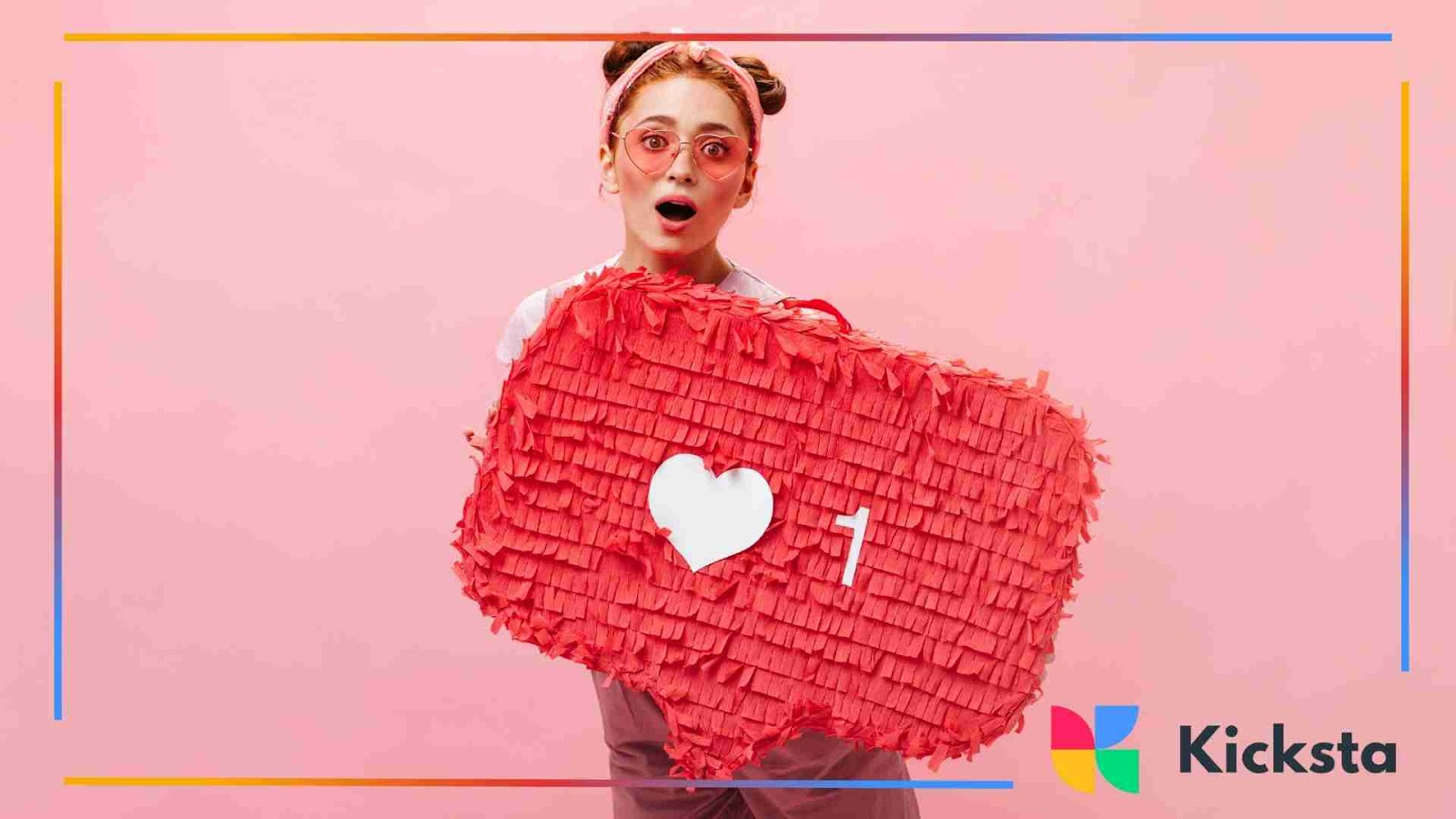 Young woman holding a large red Instagram-like icon with excitement.