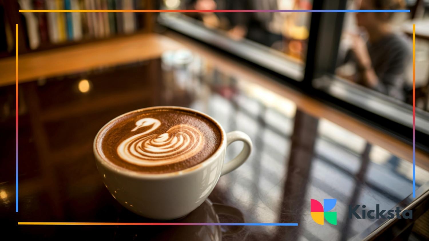 Cup of cappuccino with a swan-shaped latte art design sitting on a reflective café table