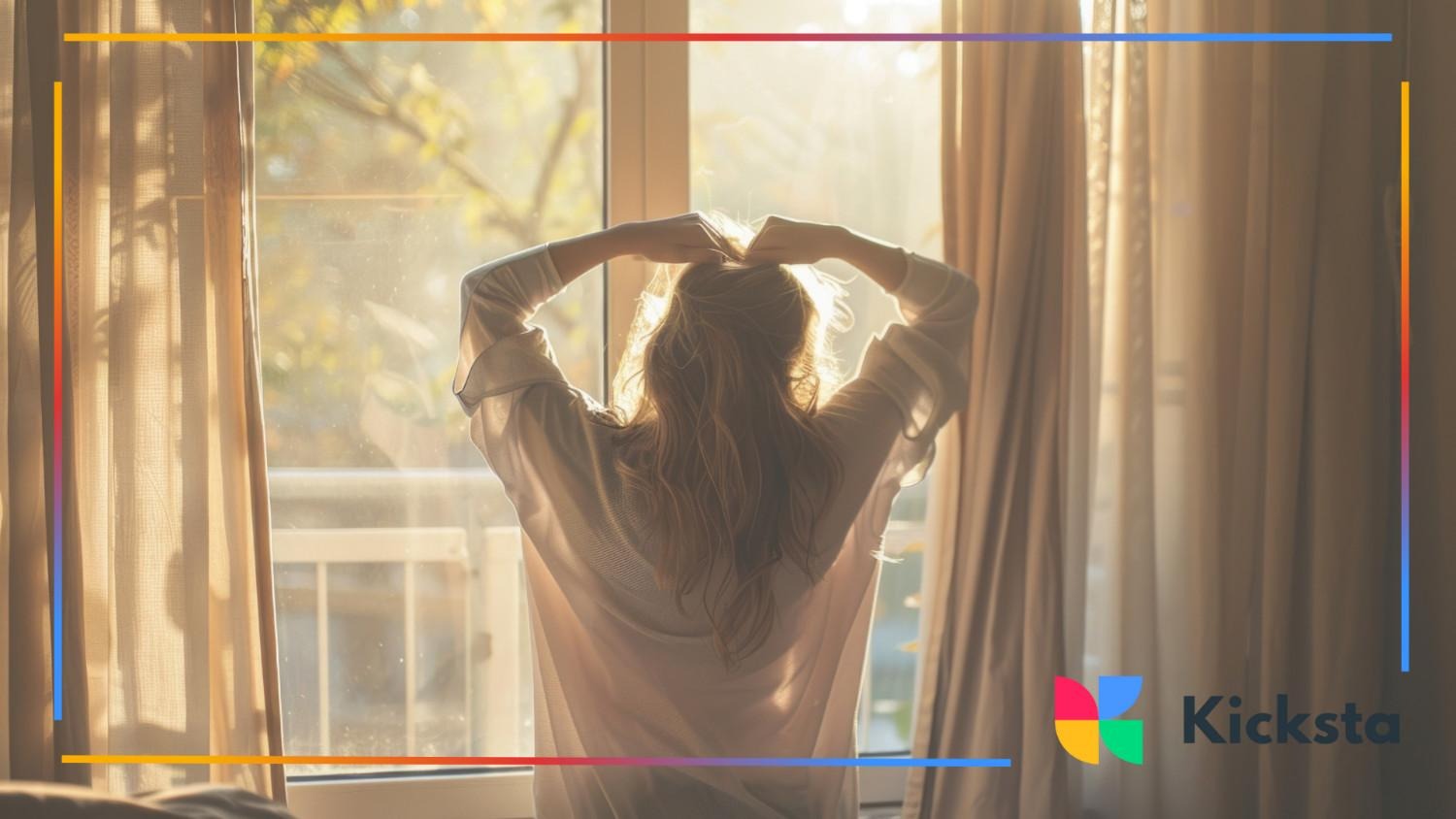 Person standing by a window stretching in soft morning sunlight