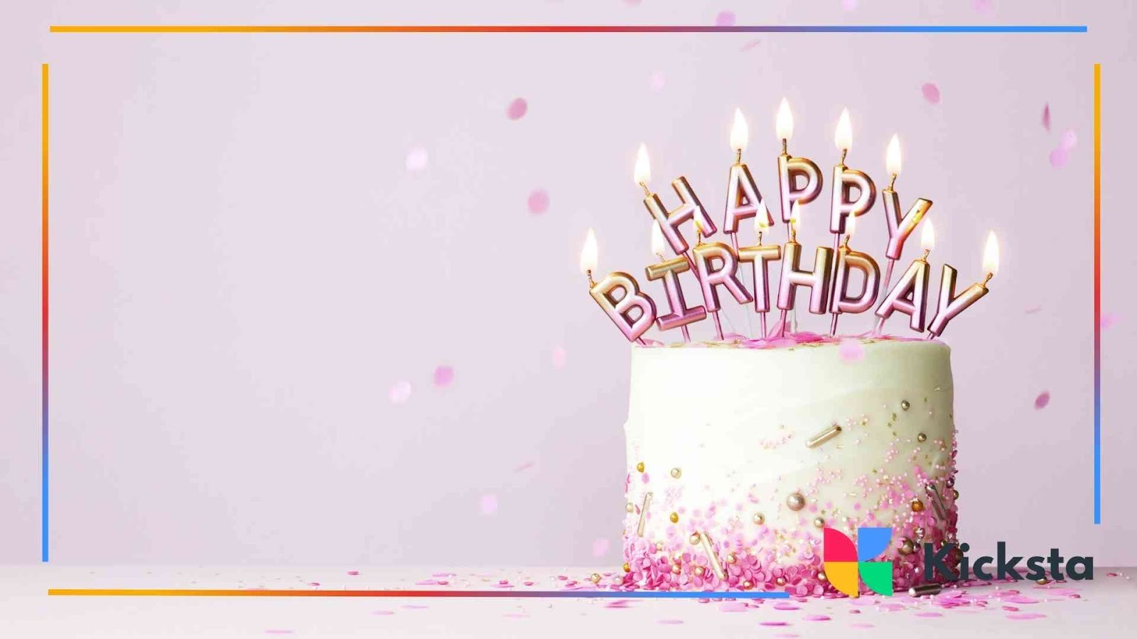 White and pink birthday cake decorated with lit candles spelling “HAPPY BIRTHDAY” on a pastel background