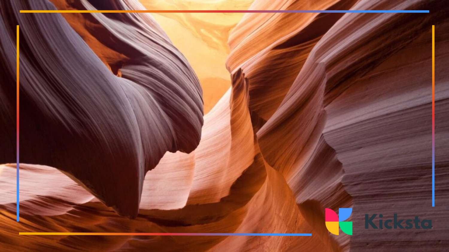 Antelope Canyon’s narrow sandstone formations with flowing shapes and warm orange light illuminating the walls.