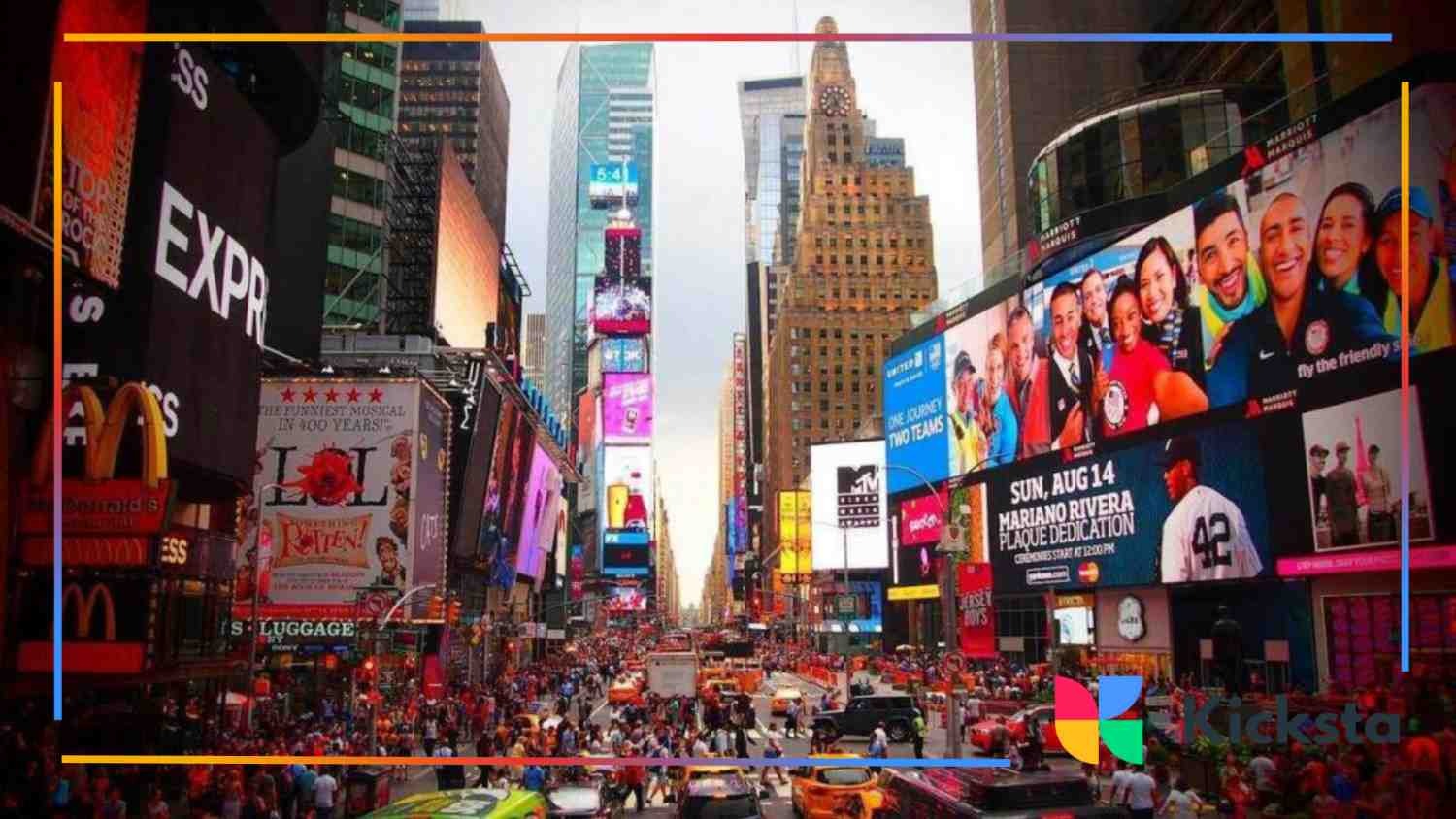Times Square in New York City bustling with crowds, taxis, and vibrant digital billboards lighting up the streets.