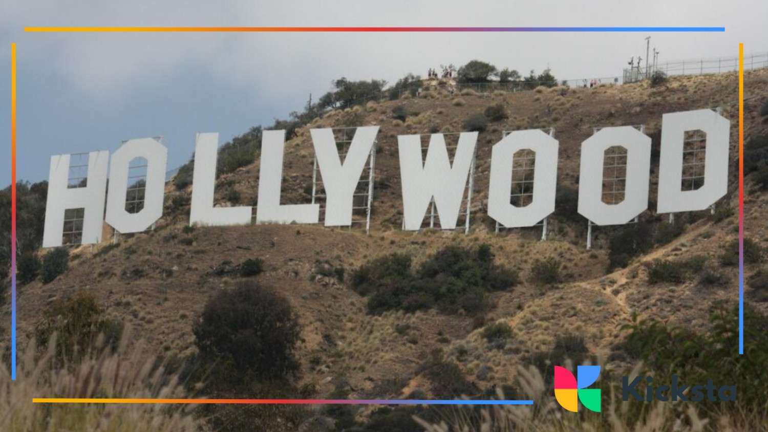 Iconic Hollywood sign on a hillside in Los Angeles surrounded by dry vegetation