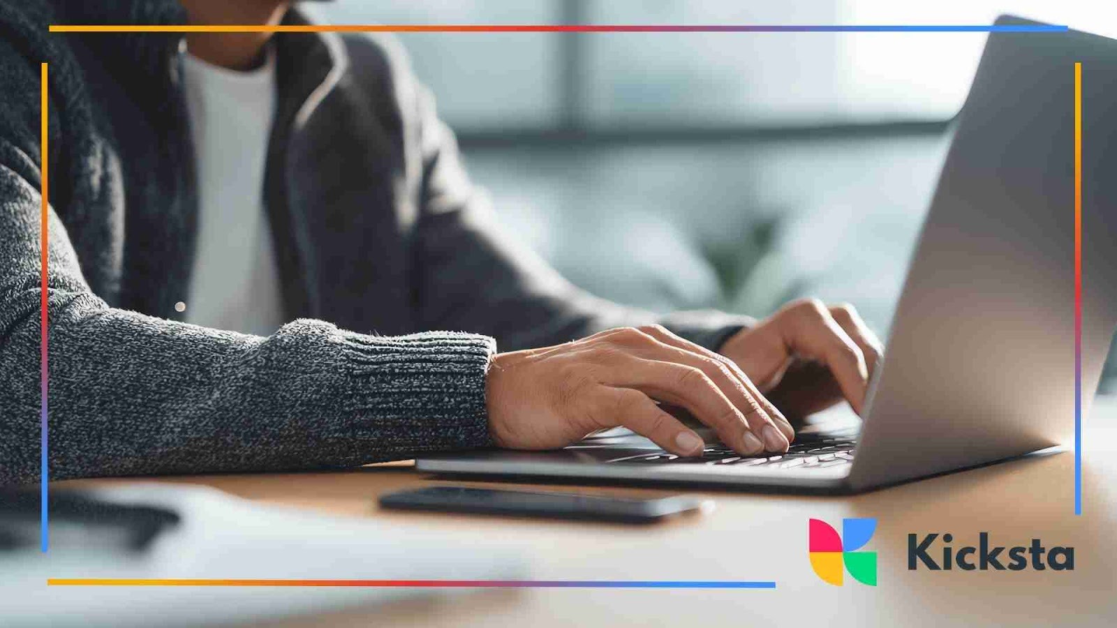 Person typing on a laptop, representing social media team productivity and digital workflow.
