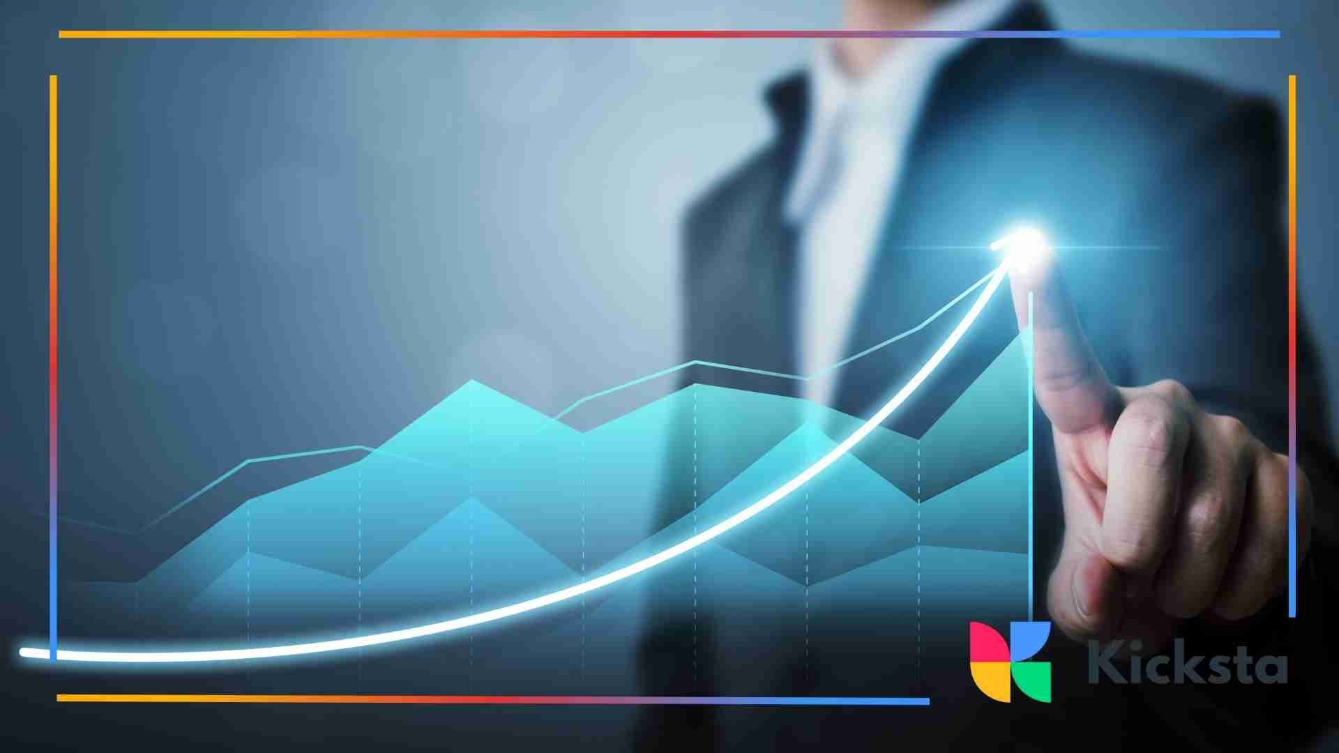 Person in a suit touching a glowing upward graph line.