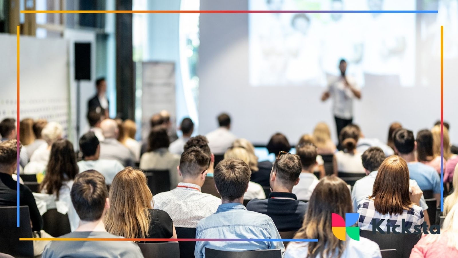 Audience attending business conference with speaker presenting on stage, symbolizing networking, professional growth, and knowledge sharing.