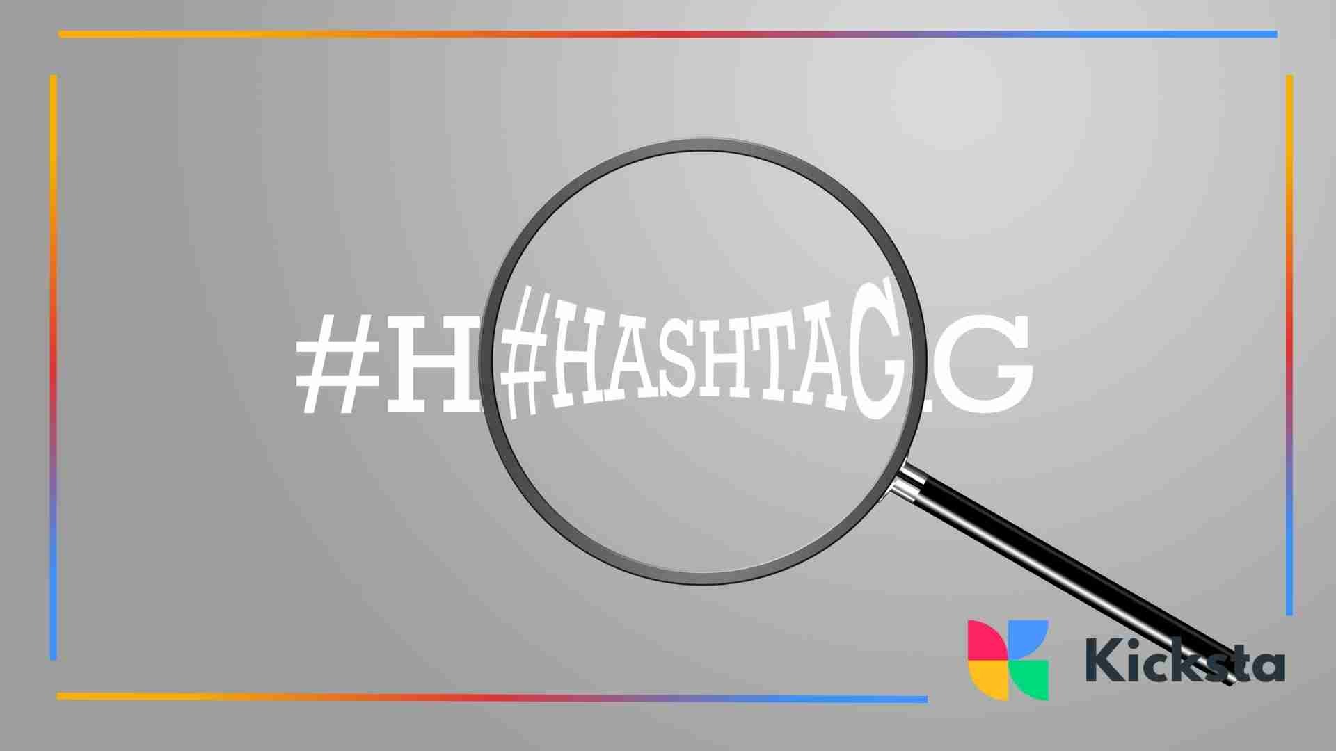 A magnifying glass highlighting the word “#HASHTAG” against a gray background.