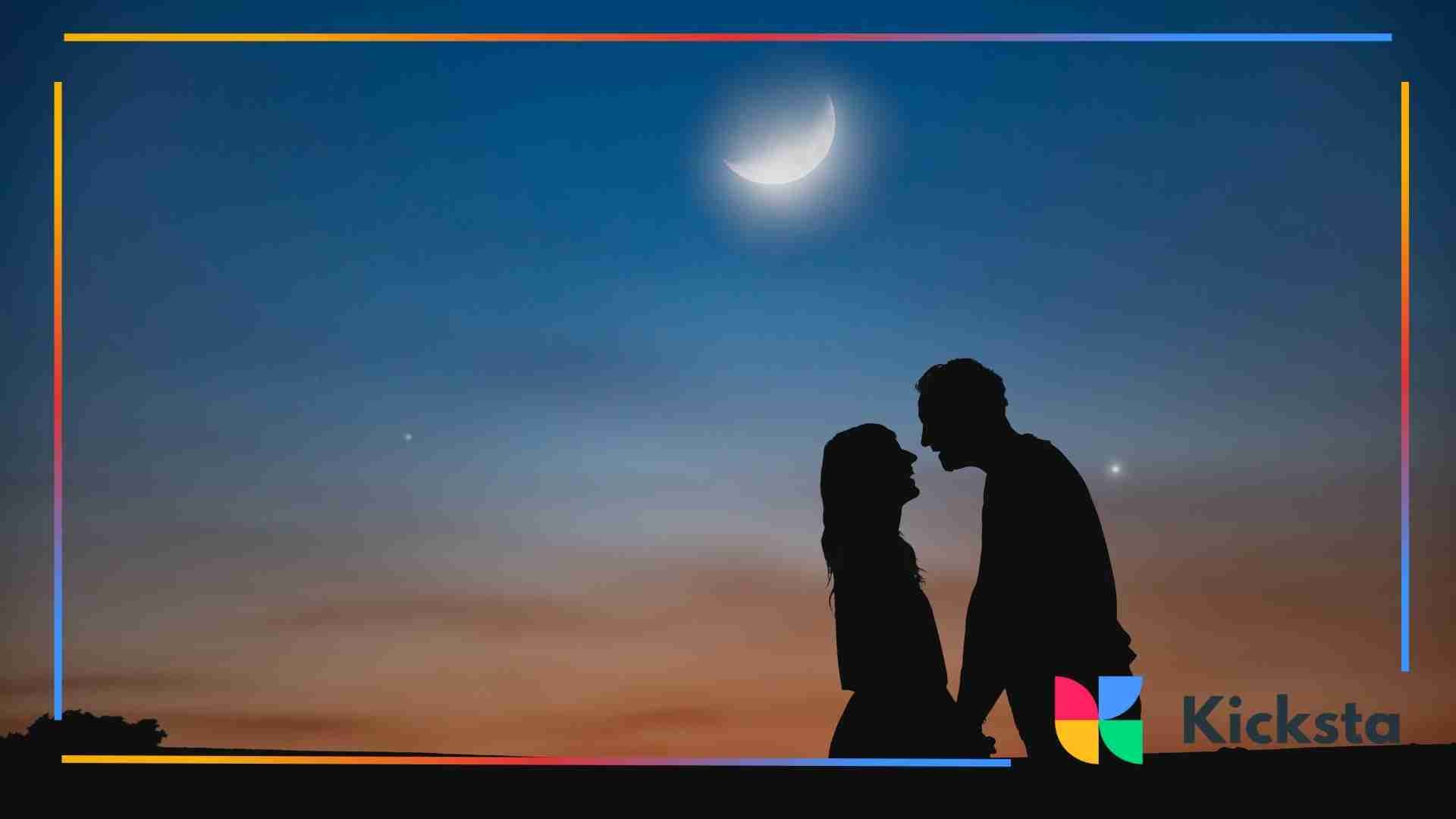 Silhouetted couple leaning in for a kiss beneath a glowing crescent moon at sunset.