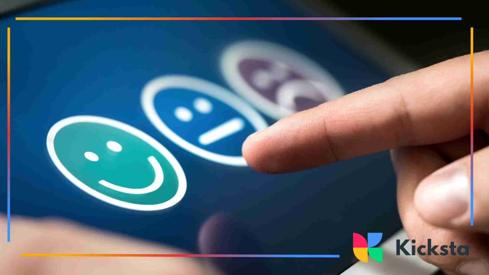 Finger tapping a digital smiley-face feedback scale on a touchscreen, showing happy, neutral, and sad icons.