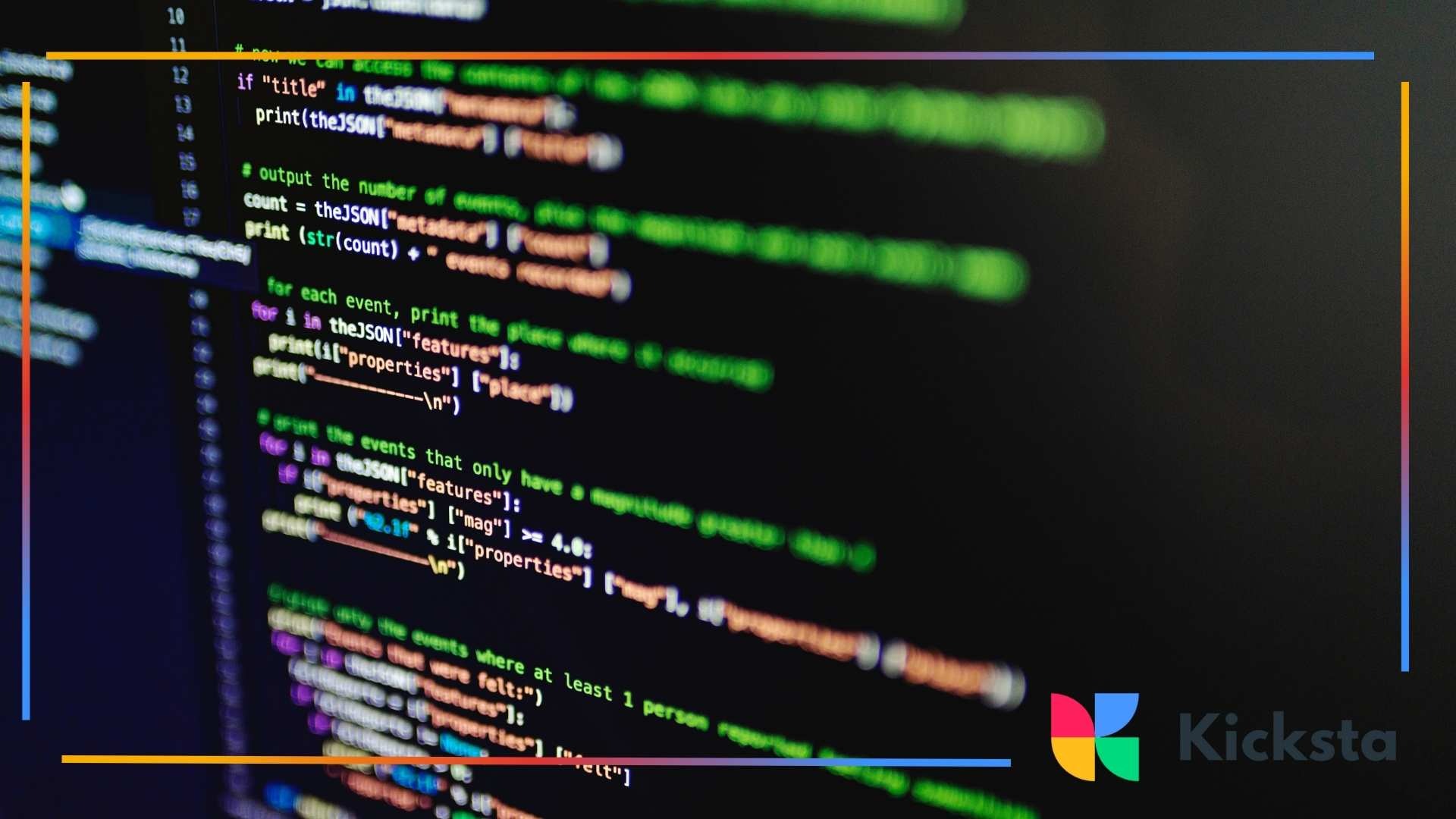 Close-up of a computer screen displaying colorful lines of programming code.